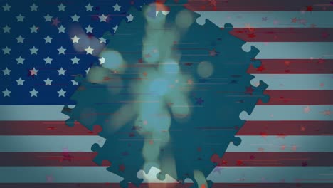 Animation-of-glowing-sparkler-and-jigsaw-puzzle-over-american-flag