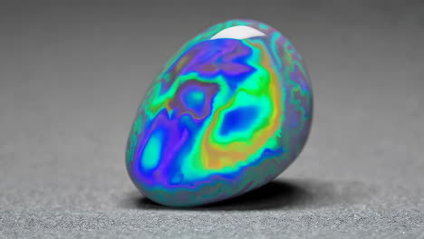 vibrant iridescent polished gemstone with abstract color swirls