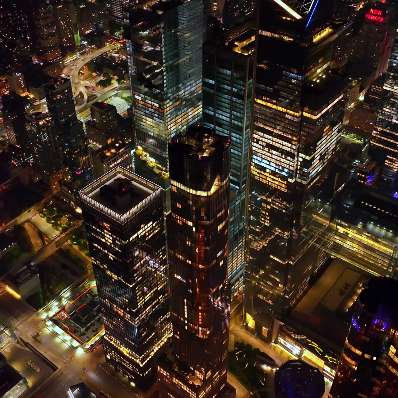 Dazzling panorama of marvelous New York at night. Drone footage over the vibrant city full of light