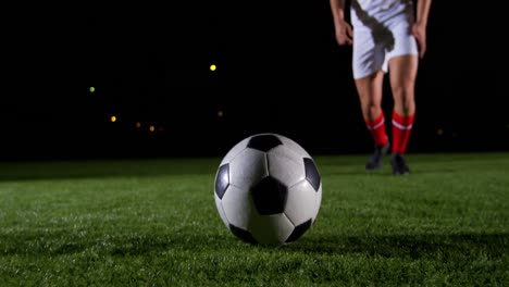 soccer player kicking the ball 4k