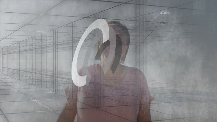 Standing in grid-like environment, person surrounded by abstract geometric animation