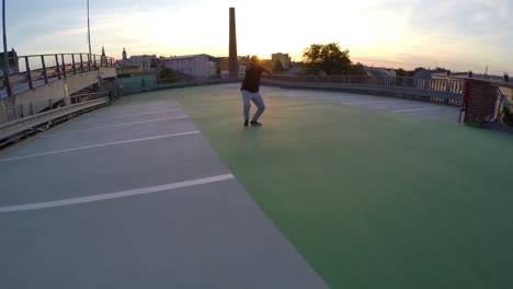 dancer at the top of the garage building-place