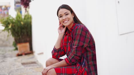 woman in plaid dress