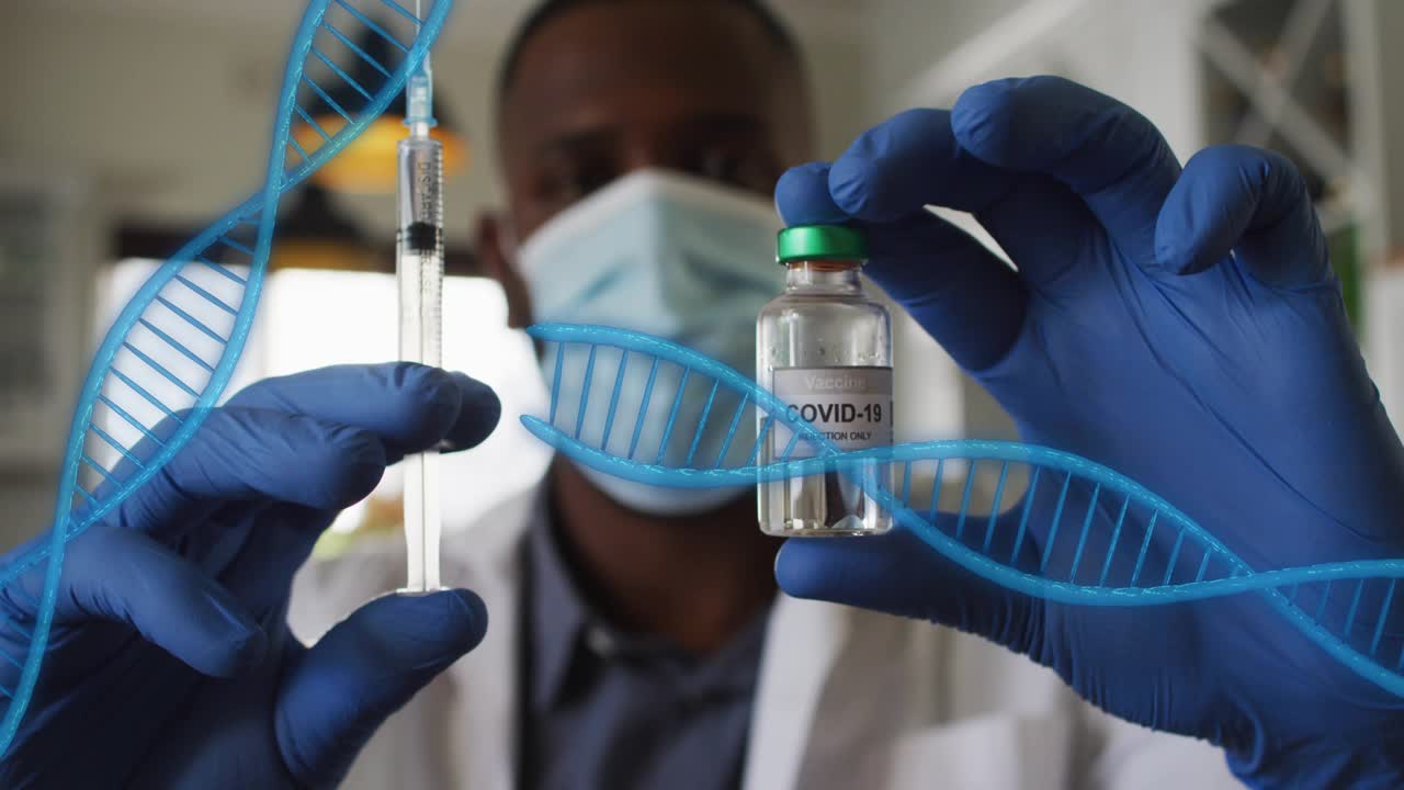 Dr handling syringe and COVID19 vial, gloved hands entering aligning preparing dose under DNA helix