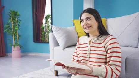 Charming-happy-young-woman-reading-book.