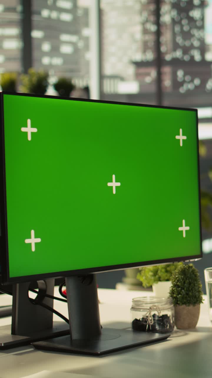 Vertical video Office clerk working on isolated screen PC to hit key performance targets