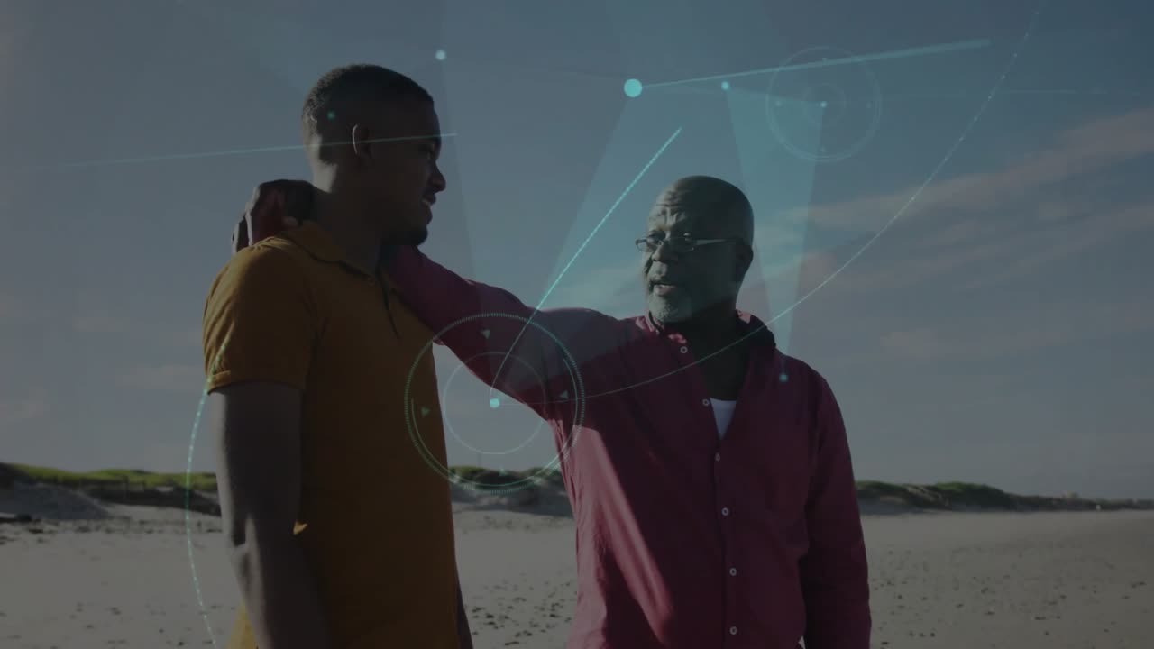 Father placing hand on son's shoulder at beach, initiating technology nodes symbolizing connection