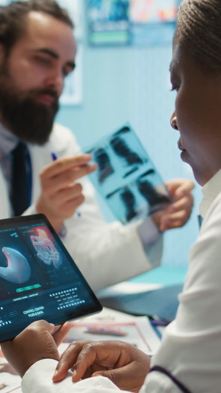 Vertical Video Medical team collaborates on diagnostic procedures and treatment plans
