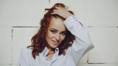stylish woman in studio. young stylish woman posing in studio
