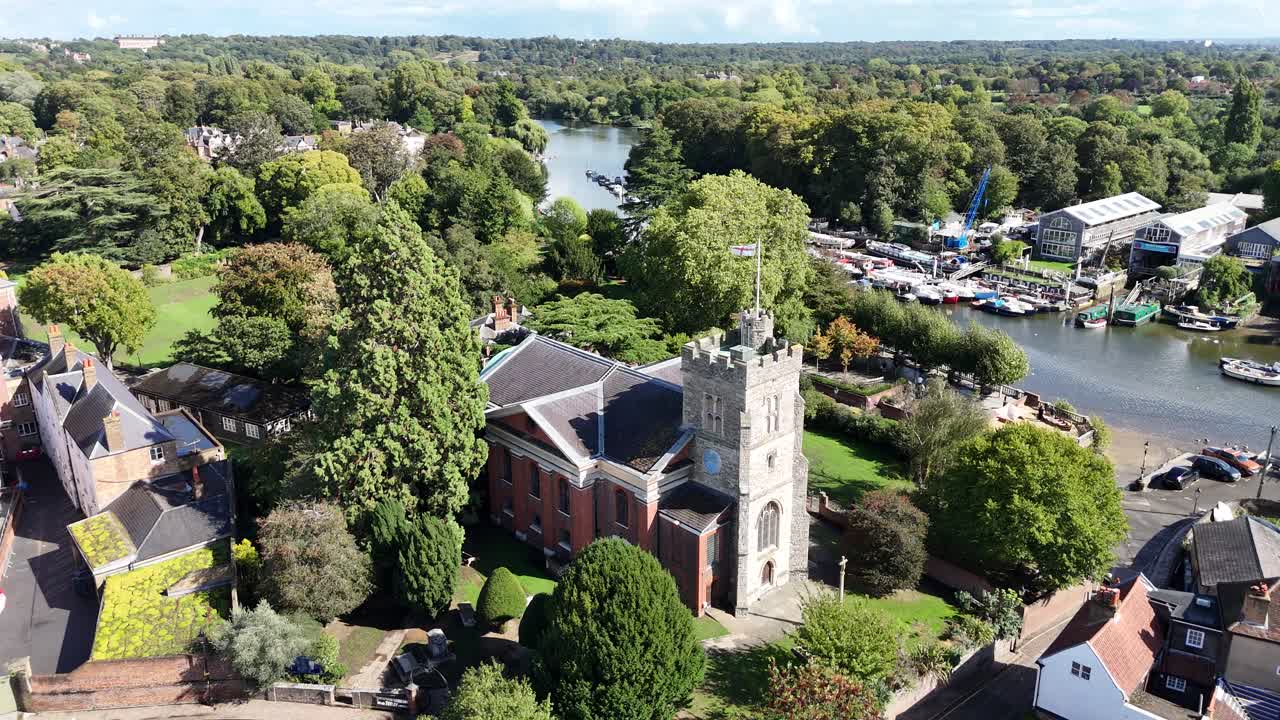 Aerial View of a Church by the River
