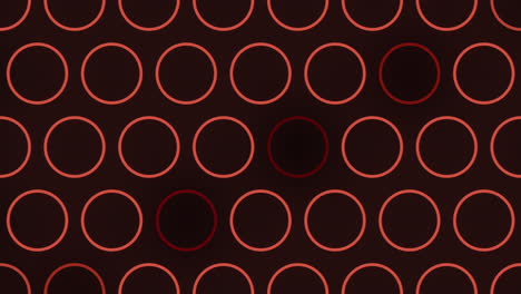 patrón de círculo rojo brillante sobre fondo oscuro