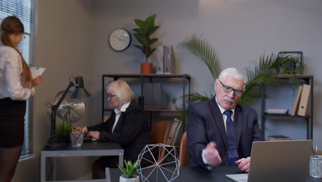 three business people in a office setting