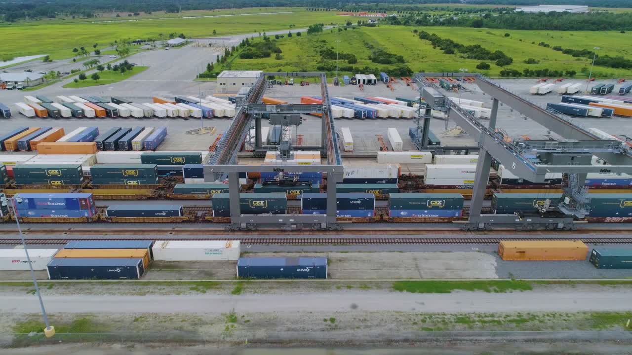 4K Drone Video of Trains and Trucks at CSX Intermodal Train Yard in Winter Haven, FL