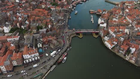 Aerial-View-Of-Whitby-Swing-Bridge-Over-River-Esk-In-Yorkshire,-Northern-England,-United-Kingdom