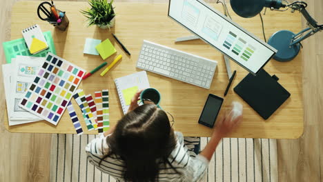 Designer working on a project at home