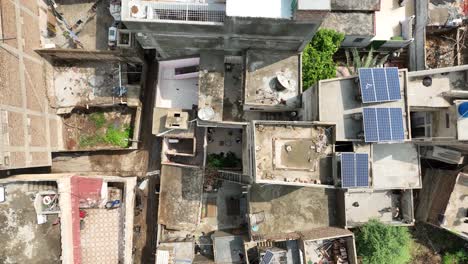 aerial birds eye view over dense building rooftops in badin