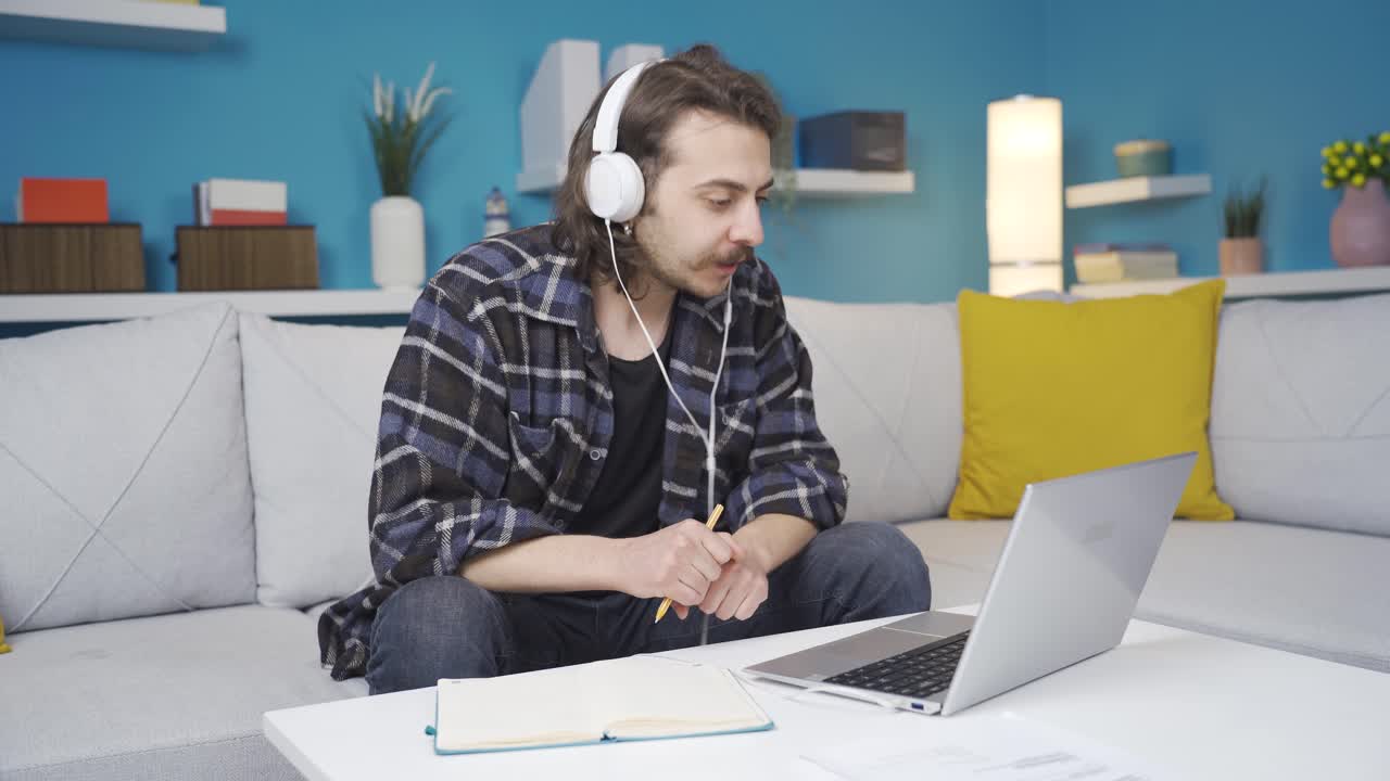 Home office worker happy man. Online meeting.