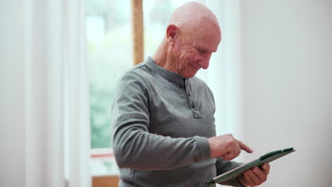 Happy,-scroll-or-old-man-with-tablet-in-home