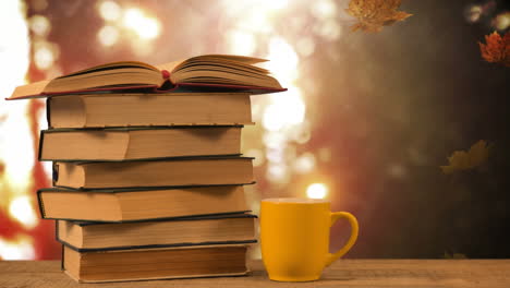 books and coffee cup against falling autumn leaves and bright background 4k