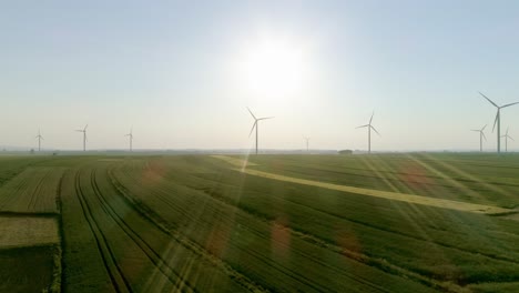 drone view of wind turbines on the field