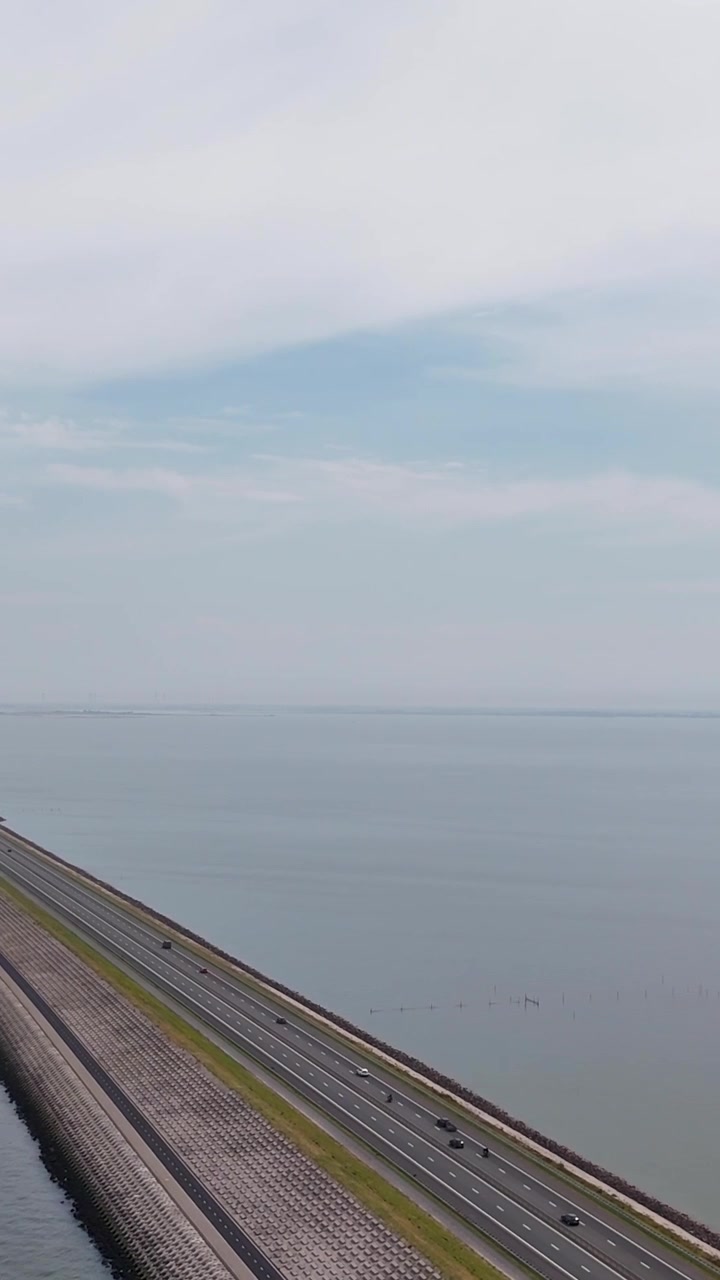 Aerial View of Cars Driving on Coastal Highway Causeway