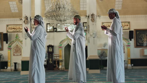 muslim men praying in a mosque
