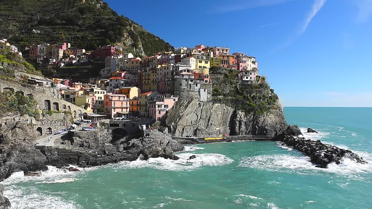 Manarola is a small coastal town in Liguria, Northern Italy, and one of the iconic Cinque Terre villages. Famous for its colourful cliffside houses, charming harbour and breathtaking sea views