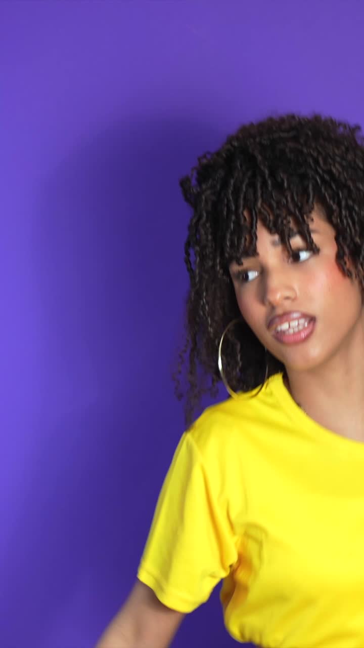 Portrait of a Woman with Curly Hair and Overalls