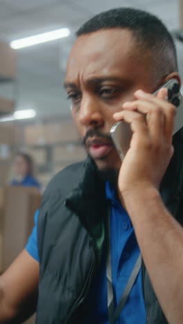 warehouse worker on phone