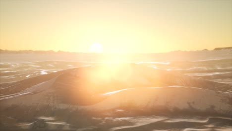 red sand desert dunes at sunset