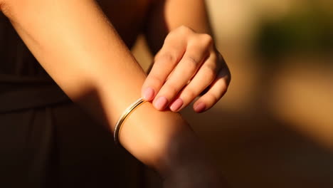 close-up of a woman's hand wearing a bracelet