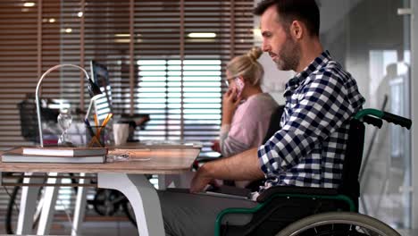 close up of man's in a wheelchair in office