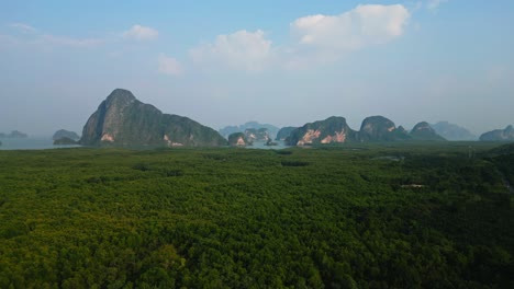 Forward-drone-shot-of-Samet-Nangshe,-One-of-most-famous-place-in-south-of-Thailand-with-mangrove-forest-and-limestone-mountains-in-Andaman-sea