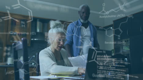 chemical formulas and molecular structures animation over people working on laptop