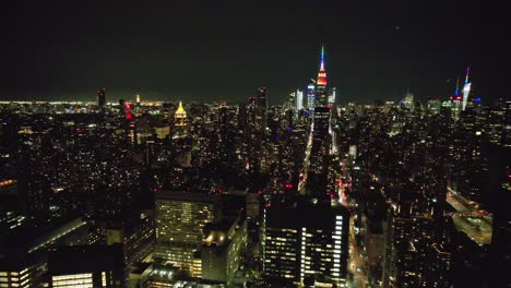 A-high-angle,-aerial-view-of-Manhattan-from-over-the-East-River-in-NY