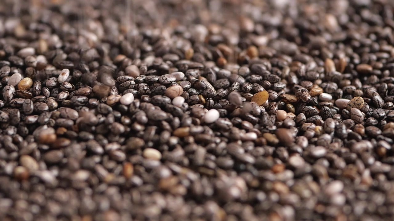 Chia Seeds Pouring Down in a Detailed Close-up