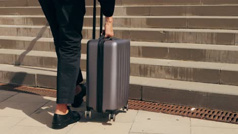 Tourist man with suitcase baggage in spain, A traveler with luggage suit jacket on business street go to a hotel, business office, airport terminal, enjoying the vibrant atmosphere