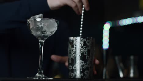 bartender mixing a cocktail