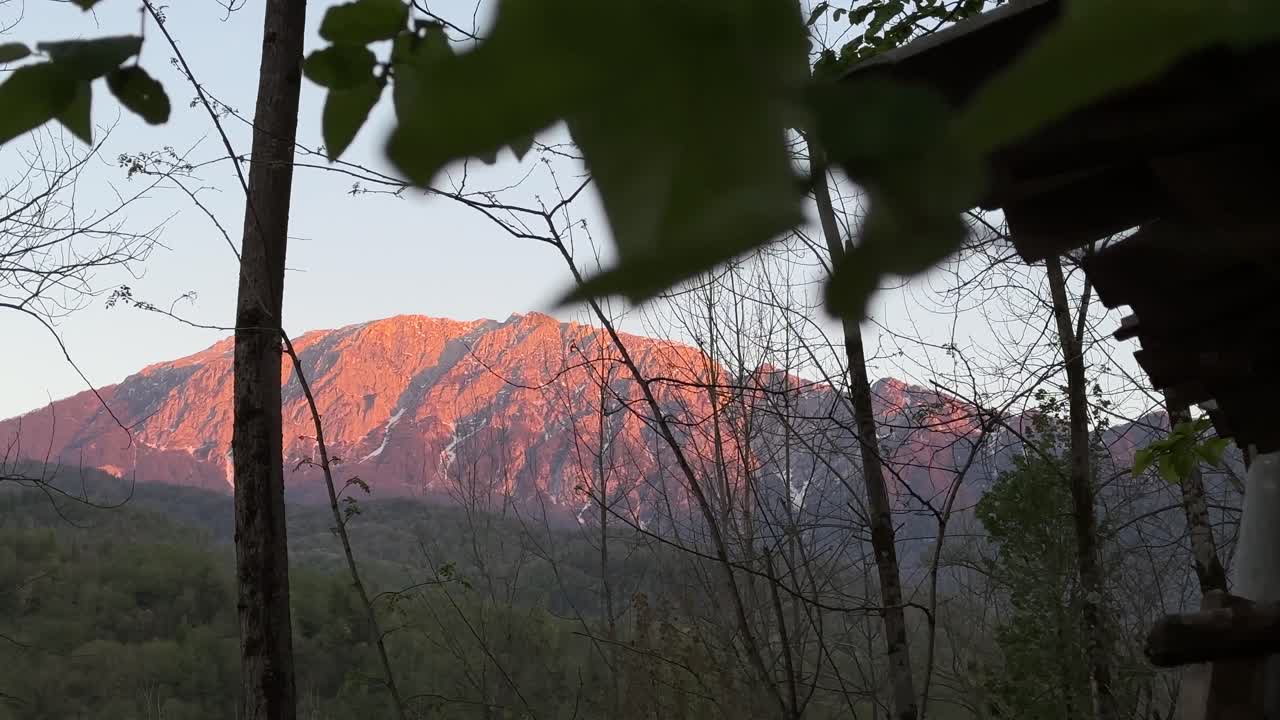 sunset golden time snow mountain from a spring season nature of forest in middle east alpine Nepal rocky Chile Patagonia landscape of Everest in Rasht Gilan brown hills old hut in outdoor cab Sweden