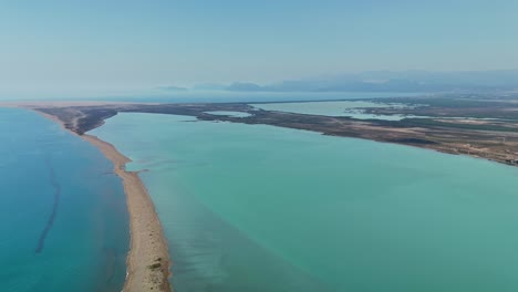aerial view of turquoise coastline, serene and calm atmosphere