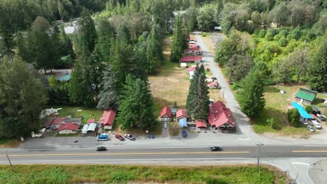 panning aerial view of baring, washington's main strip off the highway