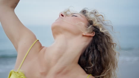 mesmerizing girl dancing nature look camera magnetically close up. curly dancer