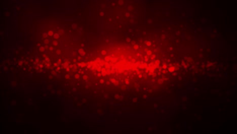 partículas móviles de color rojo desfocalizadas