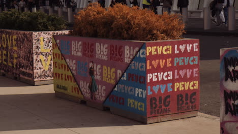 decorated flower pot with love and peace words in new york city