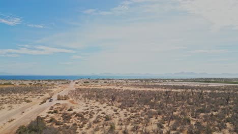 desert road in el mogote near la paz, baja california sur on a sunny day