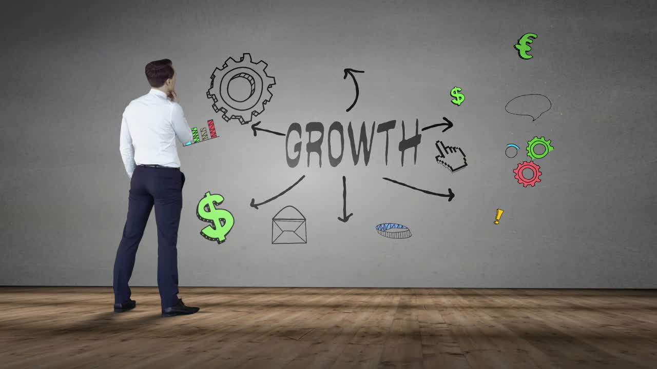 Businessman looking at wall with growth brainstorm