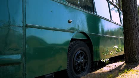 old soviet russia style bus side with wheel and panning shot that was used in chernobyl disaster