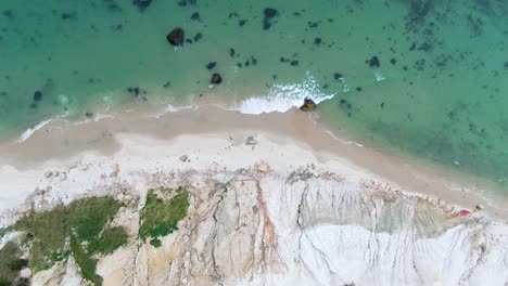 Waves-Crashing-In-Coast-Of-Aquinnah-By-The-Gay-Head-Cliffs--aerial-shot