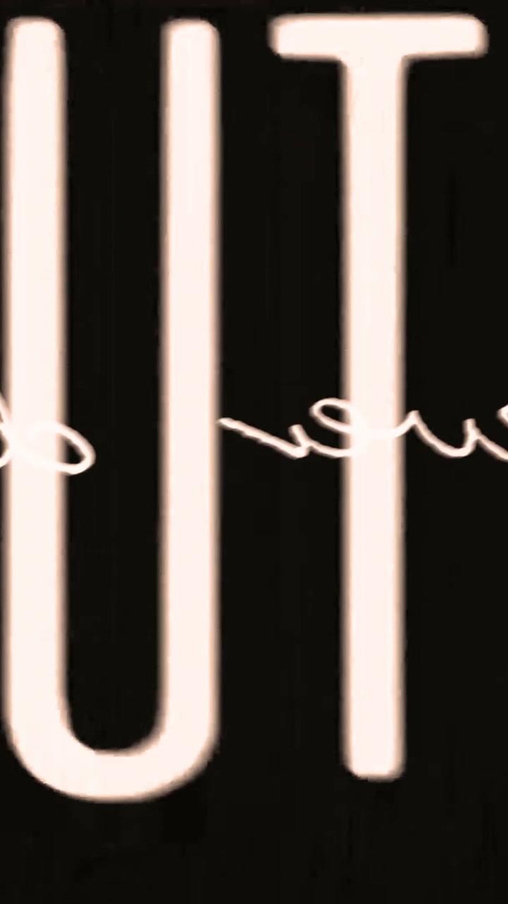 Animated Neon Text Displaying Beauty on Black Background