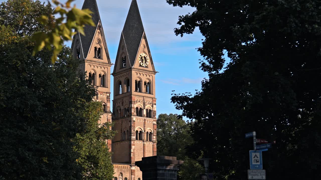The historic Basilica of St. Castor, the oldest preserved church in Koblenz, Germany, prominently featuring its twin Romanesque western towers